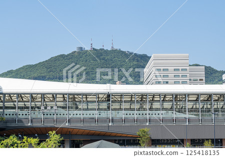 Nagasaki City, Nagasaki Prefecture: The rebuilt JR Nagasaki Station (with a parked Shinkansen train and Mount Inasa visible in the background) Nagasaki City, Nagasaki Prefecture: The rebuilt JR Nagasaki Station (with a parked Shinkansen train and Mount Inasa visible in the background) 125418135