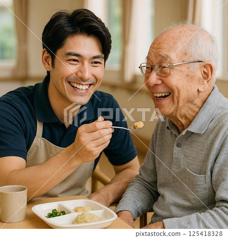 A moment filled with smiles as we assist with meals 125418328