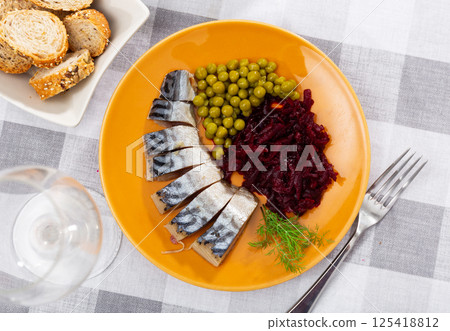 Cold smoked mackerel with beetroot and green peas Cold smoked mackerel with beetroot and green peas 125418812