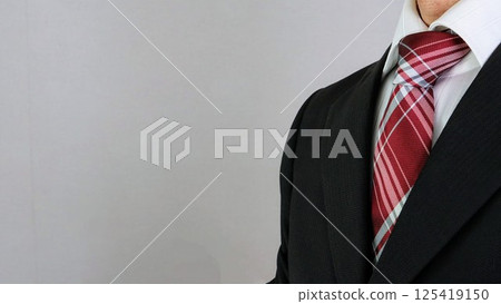 Close-up of a businessman in a suit Close-up of a businessman in a suit 125419150
