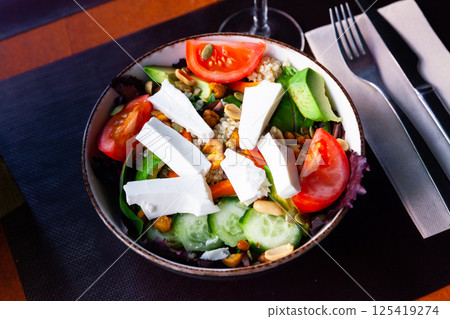 vegetarian salad with cheese and quinoa for dinner vegetarian salad with cheese and quinoa for dinner 125419274