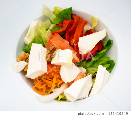 Vegetarian salad with cheese and walnut 125419349