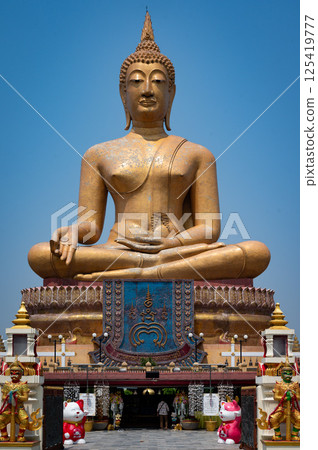 Singburi, Thailand, March 23, 2025, Majestic Buddha statue at Wat Phikun Thong 125419777