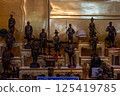 Singburi, Thailand, March 23, 2025, Detailed display of bronze statues at Wat Phra Non Chak Si Worawihan 125419785