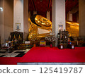 Singburi, Thailand, March 23, 2025, Golden reclining Buddha in Wat Phra Non Chak Si Worawihan 125419787
