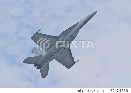 A US Navy F/A-18F Super Hornet performing a demonstration flight at the Iwakuni Air Base Air Show 125421788
