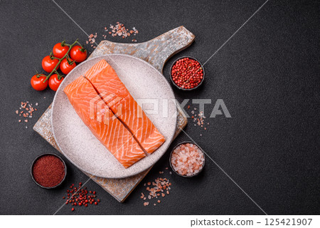 Fresh raw salmon steak with spices and herbs 125421907