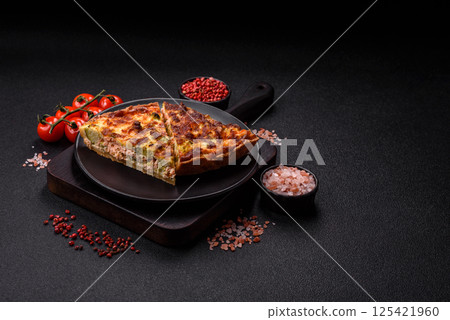 Delicious fresh quiche with broccoli, cheese, spices and herbs Delicious fresh quiche with broccoli, cheese, spices and herbs 125421960