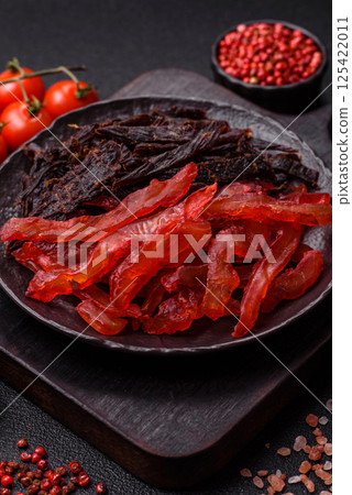 Jerky, dried chicken slices with salt and spices Jerky, dried chicken slices with salt and spices 125422011