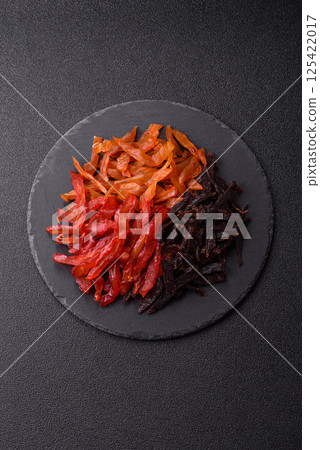 Jerky, dried chicken slices with salt and spices 125422017