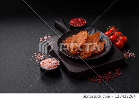 Jerky, dried chicken meat with salt and spices 125422264