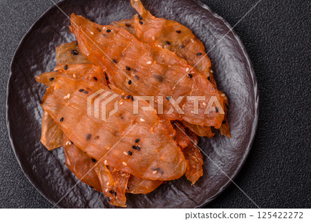 Jerky, dried chicken meat with salt and spices Jerky, dried chicken meat with salt and spices 125422272