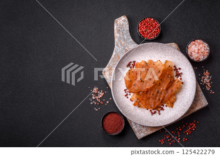 Jerky, dried chicken meat with salt and spices 125422279