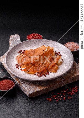 Jerky, dried chicken meat with salt and spices 125422281