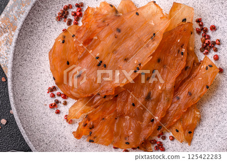 Jerky, dried chicken meat with salt and spices 125422283