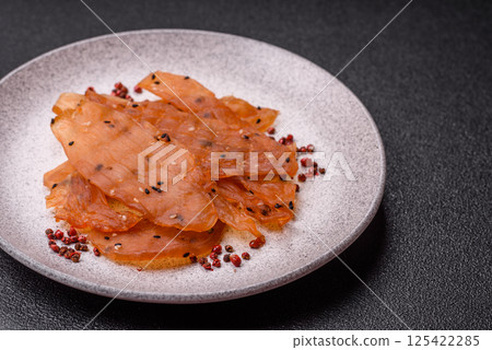 Jerky, dried chicken meat with salt and spices Jerky, dried chicken meat with salt and spices 125422285
