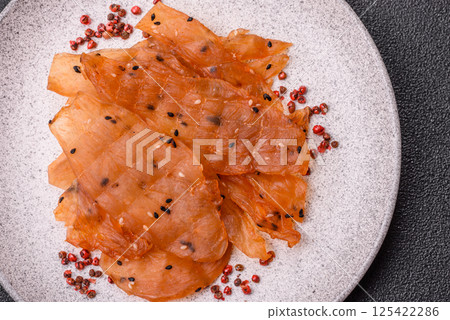 Jerky, dried chicken meat with salt and spices Jerky, dried chicken meat with salt and spices 125422286