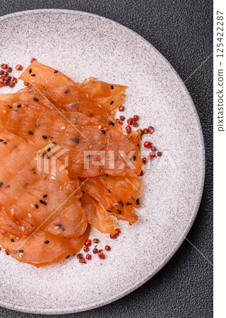 Jerky, dried chicken meat with salt and spices Jerky, dried chicken meat with salt and spices 125422287