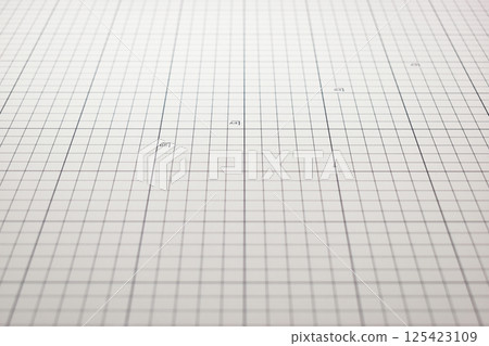 gray cutting mat board background with line and scale measure guide pattern for object art design gray cutting mat board background with line and scale measure guide pattern for object art design 125423109