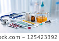 close up of syringe and pills in lab 125423392