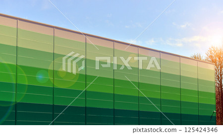 Facade of an industrial building and warehouse. 125424346