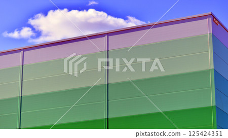 Facade of an industrial building and warehouse. Facade of an industrial building and warehouse. 125424351