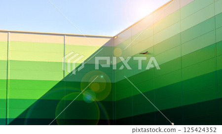 Facade of an industrial building and warehouse. Facade of an industrial building and warehouse. 125424352