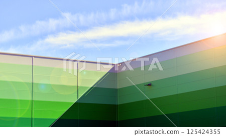 Facade of an industrial building and warehouse. 125424355