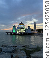 Illuminated Melaka Straits Mosque after sunset in the World Heritage city of Melaka, Malaysia 125425058