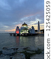 Illuminated Melaka Straits Mosque after sunset in the World Heritage city of Melaka, Malaysia 125425059