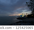 Illuminated Melaka Straits Mosque after sunset in the World Heritage city of Melaka, Malaysia 125425065