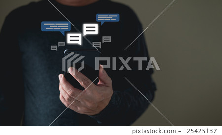 man using smartphone and touch icon social media for online marketing, work from anywhere. technology internet networking, playing social media and living on holiday concept. 125425137