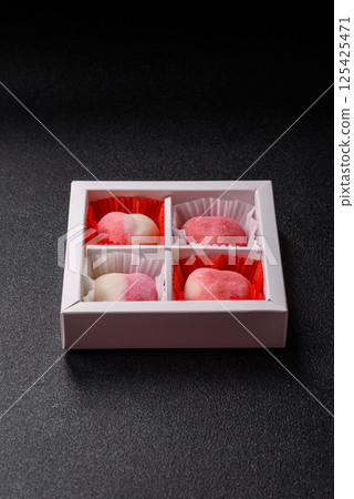 Delicious sweet mochi in the shape of red hearts 125425471