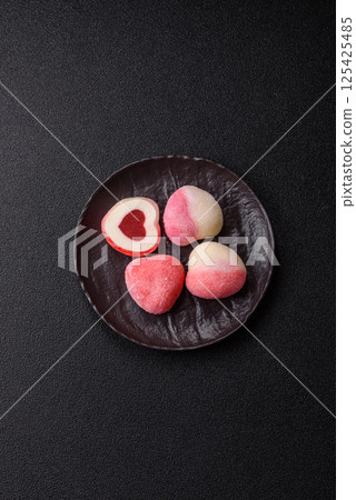 Delicious sweet mochi in the shape of red hearts Delicious sweet mochi in the shape of red hearts 125425485