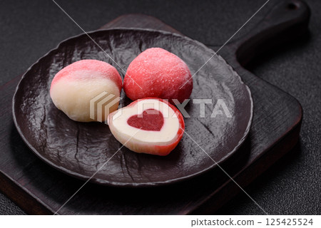 Delicious sweet mochi in the shape of red hearts 125425524