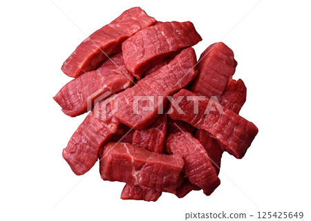 Raw beef tenderloin cut into slices with salt and spices Raw beef tenderloin cut into slices with salt and spices 125425649