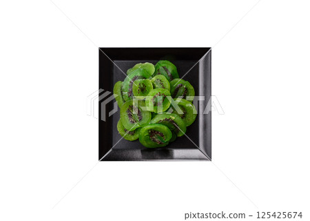 Dried sweet green kiwi or candied fruit Dried sweet green kiwi or candied fruit 125425674