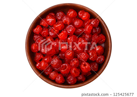 Dried sweet red pitted cherries or candied fruits 125425677