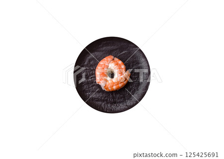 Donut shaped sushi rolls with salmon, shrimp and tuna Donut shaped sushi rolls with salmon, shrimp and tuna 125425691