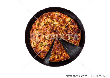 Delicious fresh quiche with broccoli, cheese, spices and herbs 125425922