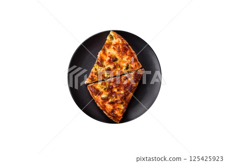 Delicious fresh quiche with broccoli, cheese, spices and herbs 125425923