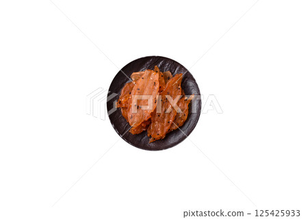 Jerky, dried chicken meat with salt and spices 125425933