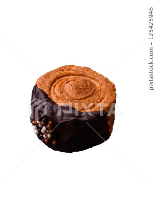 Round sweet New York roll croissant with chocolate cream filling Round sweet New York roll croissant with chocolate cream filling 125425946