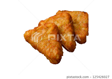 Hash browns with potatoes and onions, salt and spices Hash browns with potatoes and onions, salt and spices 125426027