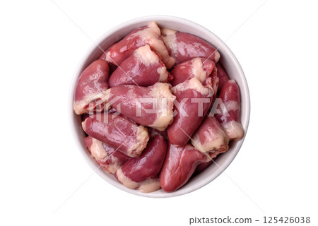 Raw chicken hearts with salt, spices and herbs Raw chicken hearts with salt, spices and herbs 125426038