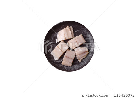 Herring fillet salted and marinated with salt, spices and oil 125426072