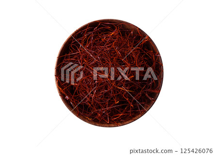 Red thin hot chili threads on a dark background 125426076
