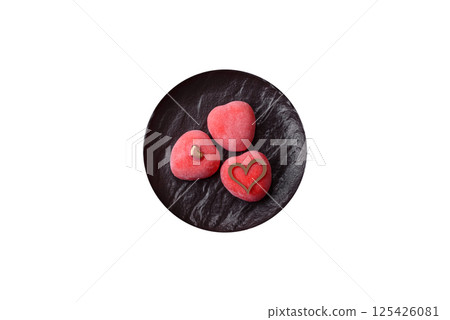 Delicious sweet mochi in the shape of red hearts 125426081