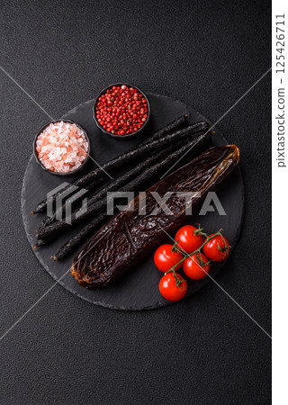 Horse meat sausage with salt, spices and herbs Horse meat sausage with salt, spices and herbs 125426711