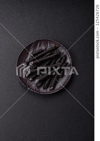 Horse meat sausage with salt, spices and herbs Horse meat sausage with salt, spices and herbs 125426726